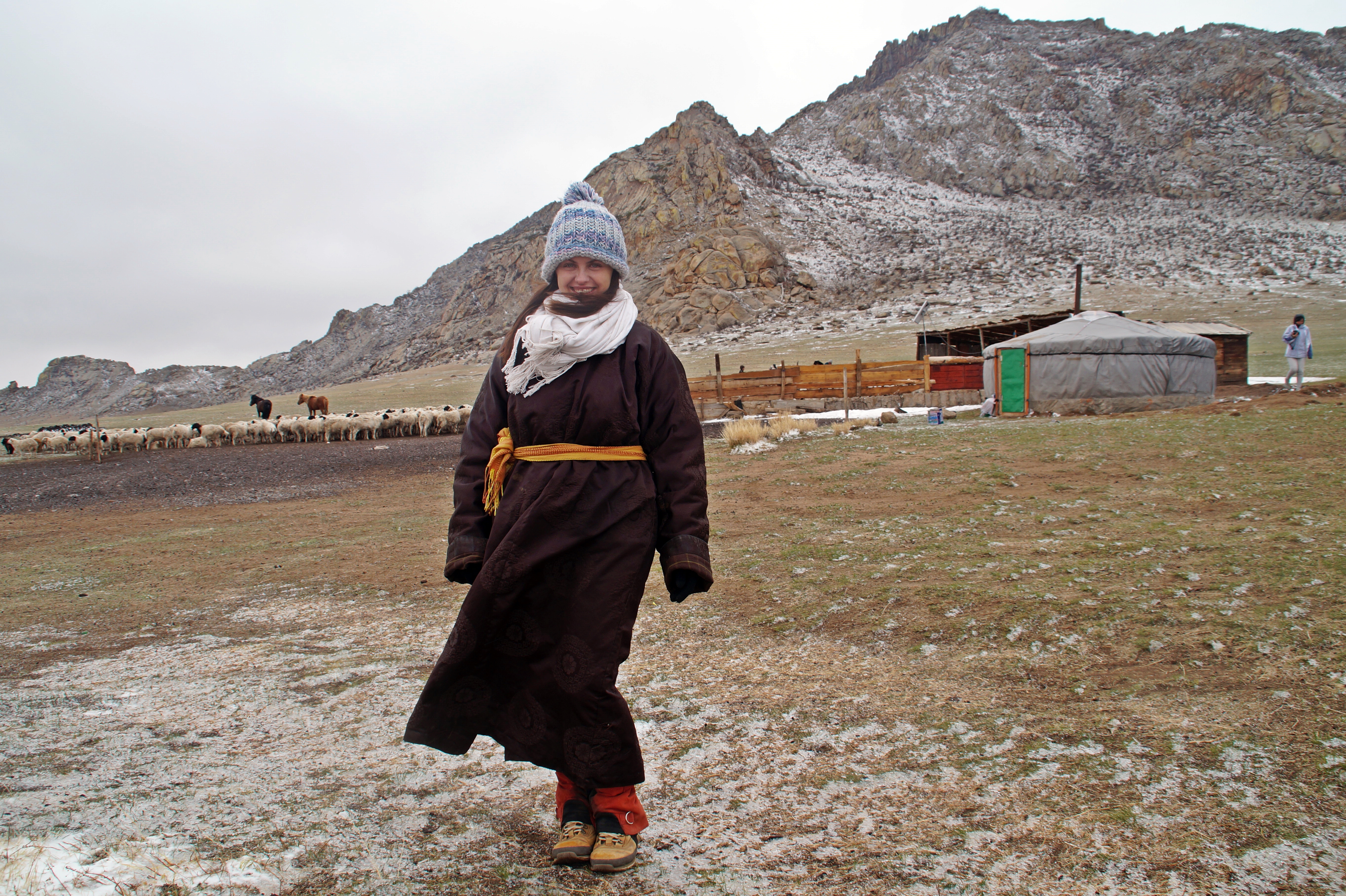 Wearing a deel in front of a ger in Central Mongolia